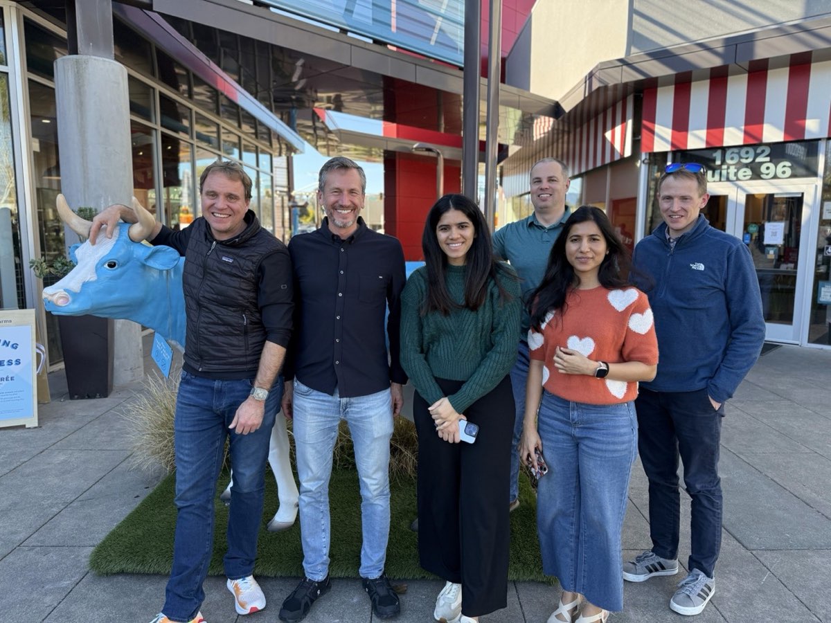 The team outside, together